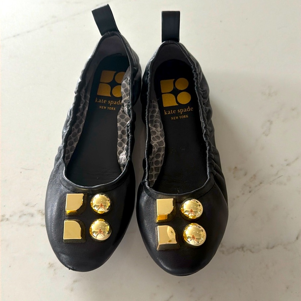 Black and gold ballet flats